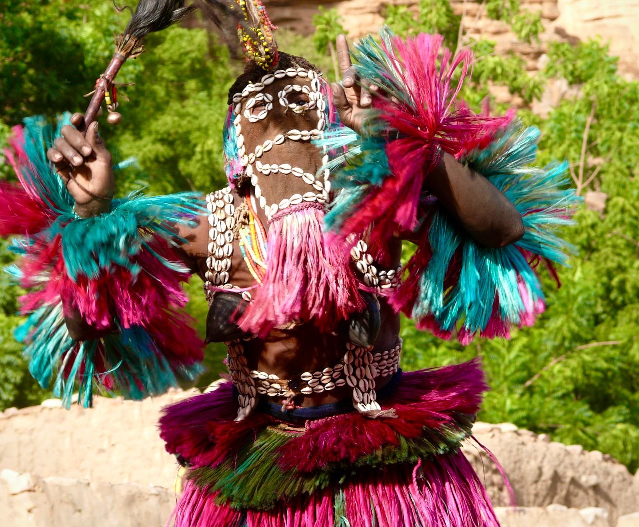 Vibrant traditional dance performed in colorful attire during Malian celebration.